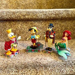 Walt Disney showcase collection of four